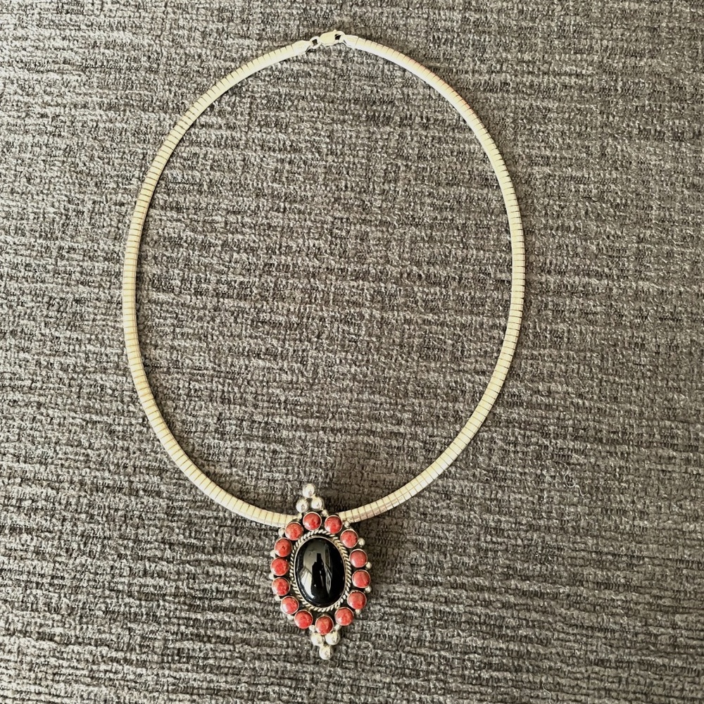 Native American silver/onyx/coral pendant with chain.